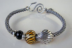 Lampwork Beads by Kathy Perras with Hill Tribe Silver bangle bracelet - by Vicky Jousan