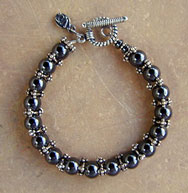 Hematite and Sterling Silver bracelet by VickyJousan