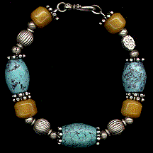 Chinese turquoise, yellow jade, Bali sterling silver necklace, bracelet and earrings by Vicky Jousan