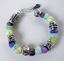 Sugilite, Opal, Phrenite hand cut beads by Africa John - .999 pure silver handmade beads - Bracelet by Vicky Jousan