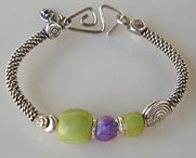 Hand Sculpted Sugilite and Gaspeite beads with Hill Tribe Silver bangle bracelet